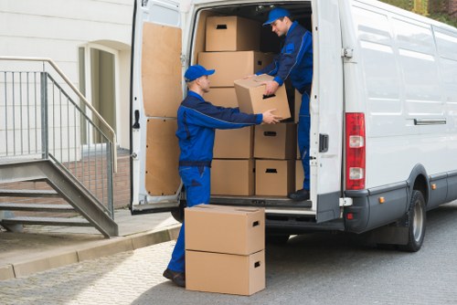 Professional packing team preparing household items for a move in Finchley