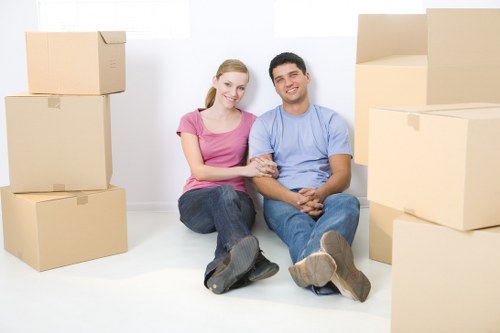 Removal team loading household items for a move in Finchley