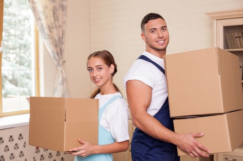 Packed moving boxes and furniture prepared for local removals