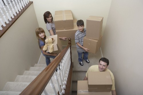 Professional moving team applying safety procedures during a local relocation
